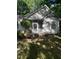 Side view of the home featuring an enclosed screened porch at 352 Riverstone Dr, Clayton, NC 27527
