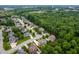 A beautiful aerial view of neighborhood and wooded areas at 3994 Limerick Dr, Burlington, NC 27215