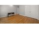 Bedroom featuring hardwood floors, closet, and neutral color scheme at 3994 Limerick Dr, Burlington, NC 27215