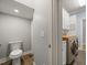 Hallway leading to laundry room with easy access to the toilet at 3994 Limerick Dr, Burlington, NC 27215