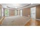 Large main bedroom featuring tray ceilings and tons of natural light at 3994 Limerick Dr, Burlington, NC 27215