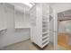 Walk-in closet features custom shelving at 3994 Limerick Dr, Burlington, NC 27215