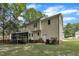 Backyard with patio, deck, and fenced yard at 418 Old Scarborough Ln, Garner, NC 27529