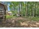 Backyard with patio, deck, and fenced yard at 418 Old Scarborough Ln, Garner, NC 27529