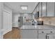 Updated kitchen features stainless steel appliances, granite countertops, and updated cabinetry at 418 Old Scarborough Ln, Garner, NC 27529