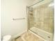 Clean bathroom featuring a large shower with glass doors and tiled walls at 4200 Harmony Church Rd, Efland, NC 27243