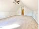 Large bonus room featuring carpet flooring and a ceiling fan at 4200 Harmony Church Rd, Efland, NC 27243