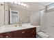 Bathroom featuring a white countertop, updated vanity, and combined tub and shower at 4401 Liverpool Ln, Raleigh, NC 27604