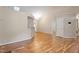 Bright, open floor plan featuring hardwood floors and a view into other living areas at 4401 Liverpool Ln, Raleigh, NC 27604