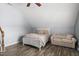 Cozy bedroom featuring a ceiling fan and daybed and comfortable furniture at 507 Littleport Dr, Rolesville, NC 27571