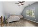 Bright bedroom featuring a daybed and large window view at 507 Littleport Dr, Rolesville, NC 27571