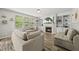 Bright living room with built-in shelves, a fireplace, and plenty of seating at 507 Littleport Dr, Rolesville, NC 27571