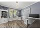 Home office featuring custom desk, and ample storage with a bright window overlooking the front yard at 507 Littleport Dr, Rolesville, NC 27571