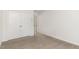 Bedroom features neutral carpet, and a closet at 5073 Tall Pines Ct, Raleigh, NC 27609