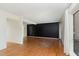 Bright living room showcasing hardwood floors and a modern accent wall at 5073 Tall Pines Ct, Raleigh, NC 27609