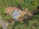 Aerial view showcasing the property's location, surrounded by lush greenery and natural beauty at 5163 S River Rd, Lillington, NC 27546