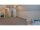 Spacious bonus room with carpeting and ensuite bathroom at 5163 S River Rd, Lillington, NC 27546