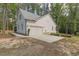 Newly constructed home with an attached two-car garage and newly laid driveway at 5163 S River Rd, Lillington, NC 27546
