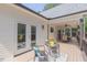 Inviting patio with outdoor seating and view of the backyard at 5163 S River Rd, Lillington, NC 27546