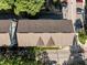 Overhead view captures the architecture, roof lines, and street layout of townhomes within a well-maintained community at 531 N Person St # 205, Raleigh, NC 27604