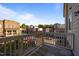 Balcony view showcasing the community's architectural design and convenient parking at 531 N Person St # 205, Raleigh, NC 27604