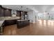 Open-concept kitchen featuring granite countertops, stainless steel appliances, and ample wooden cabinet space at 531 N Person St # 205, Raleigh, NC 27604