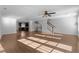 Bright living room featuring hardwood floors, modern lighting, and an open layout perfect for entertaining at 531 N Person St # 205, Raleigh, NC 27604
