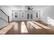 Inviting living space with hardwood floors, natural light from large windows, and easy access to the outdoors at 531 N Person St # 205, Raleigh, NC 27604