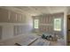 Spacious bedroom with natural light from dual windows at 55 Stream View Way, Spring Hope, NC 27882
