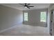 Spacious bedroom with neutral walls and large windows offering plenty of natural light at 55 Stream View Way, Spring Hope, NC 27882