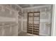 Walk-in closet with shelving units for organized storage at 55 Stream View Way, Spring Hope, NC 27882