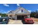 Charming new home with stone accents, white siding, and an attached two-car garage at 55 Stream View Way, Spring Hope, NC 27882