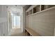 Hallway featuring a bench and built-in shelving at 55 Stream View Way, Spring Hope, NC 27882