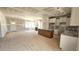 Open concept living room and kitchen area with fireplace and large island at 55 Stream View Way, Spring Hope, NC 27882