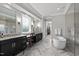 Bathroom features double sinks, walk-in closet access, and a soaking tub at 623 Westfall Way, Chapel Hill, NC 27517