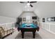 Vaulted game room featuring a pool table, pinball machine, flat screen tv, and natural light at 623 Westfall Way, Chapel Hill, NC 27517