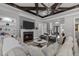 Bright living room with fireplace, coffered ceilings, and an open layout great for entertaining at 623 Westfall Way, Chapel Hill, NC 27517
