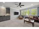 Cozy living room with multiple seating options, television and bar area at 623 Westfall Way, Chapel Hill, NC 27517