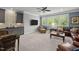 Cozy living room with multiple seating options, television and bar area at 623 Westfall Way, Chapel Hill, NC 27517