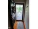 Welcoming entryway with a storm door and wood floors at 631 Springfork Dr, Cary, NC 27513