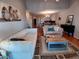 Open living room and dining room with neutral paint and hardwood floors at 631 Springfork Dr, Cary, NC 27513
