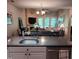 Open living space with fireplace and access to balcony/patio provides natural light and relaxation at 631 Springfork Dr, Cary, NC 27513