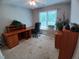 Functional office space features a large desk, comfortable chair, and natural light at 631 Springfork Dr, Cary, NC 27513