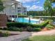 Community pool overlooking the pond at 631 Springfork Dr, Cary, NC 27513