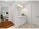 Stylish bathroom with marble countertop vanity, wood flooring, and decorative accents at 6500 Bass Mountain Rd, Snow Camp, NC 27349