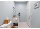 Powder room features a modern vanity with granite countertop and a framed mirror at 6500 Bass Mountain Rd, Snow Camp, NC 27349