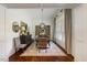 Formal dining room with hardwood floors, a modern chandelier, and elegant decor at 6500 Bass Mountain Rd, Snow Camp, NC 27349