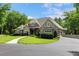 Beautifully landscaped home with a circular driveway at 6500 Bass Mountain Rd, Snow Camp, NC 27349