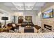 Expansive living room with coffered ceilings, a fireplace, and an open layout at 6500 Bass Mountain Rd, Snow Camp, NC 27349