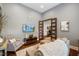 Comfortable living room with stylish decor, French doors and large-screen television at 6500 Bass Mountain Rd, Snow Camp, NC 27349